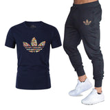 T-shirts + pantalons Deux pièces ensembles survêtement décontracté masculin 2019 T-shirts occasionnels gymnases fitness pantalons pour hommes