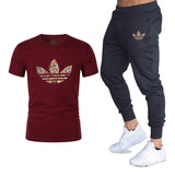 T-shirts + pantalons Deux pièces ensembles survêtement décontracté masculin 2019 T-shirts occasionnels gymnases fitness pantalons pour hommes