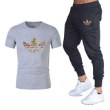 T-shirts + pantalons Deux pièces ensembles survêtement décontracté masculin 2019 T-shirts occasionnels gymnases fitness pantalons pour hommes