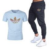 T-shirts + pantalons Deux pièces ensembles survêtement décontracté masculin 2019 T-shirts occasionnels gymnases fitness pantalons pour hommes