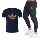 T-shirts + pantalons Deux pièces ensembles survêtement décontracté masculin 2019 T-shirts occasionnels gymnases fitness pantalons pour hommes