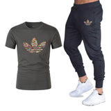 T-shirts + pantalons Deux pièces ensembles survêtement décontracté masculin 2019 T-shirts occasionnels gymnases fitness pantalons pour hommes