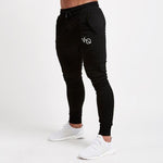Pantalon de jogging pour homme Fitness Pantalon de survêtement sportif pour homme Sportswear Bas Pantalon de survêtement skinny Pantalon noir Pantalon de survêtement noir Jogger