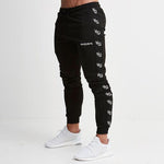 Pantalon de jogging pour homme Fitness Pantalon de survêtement sportif pour homme Sportswear Bas Pantalon de survêtement skinny Pantalon noir Pantalon de survêtement noir Jogger