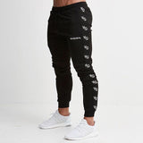 Pantalon de jogging pour homme Fitness Pantalon de survêtement sportif pour homme Sportswear Bas Pantalon de survêtement skinny Pantalon noir Pantalon de survêtement noir Jogger
